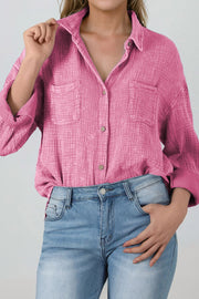 Button down collared neck long sleeve shirt with pockets.