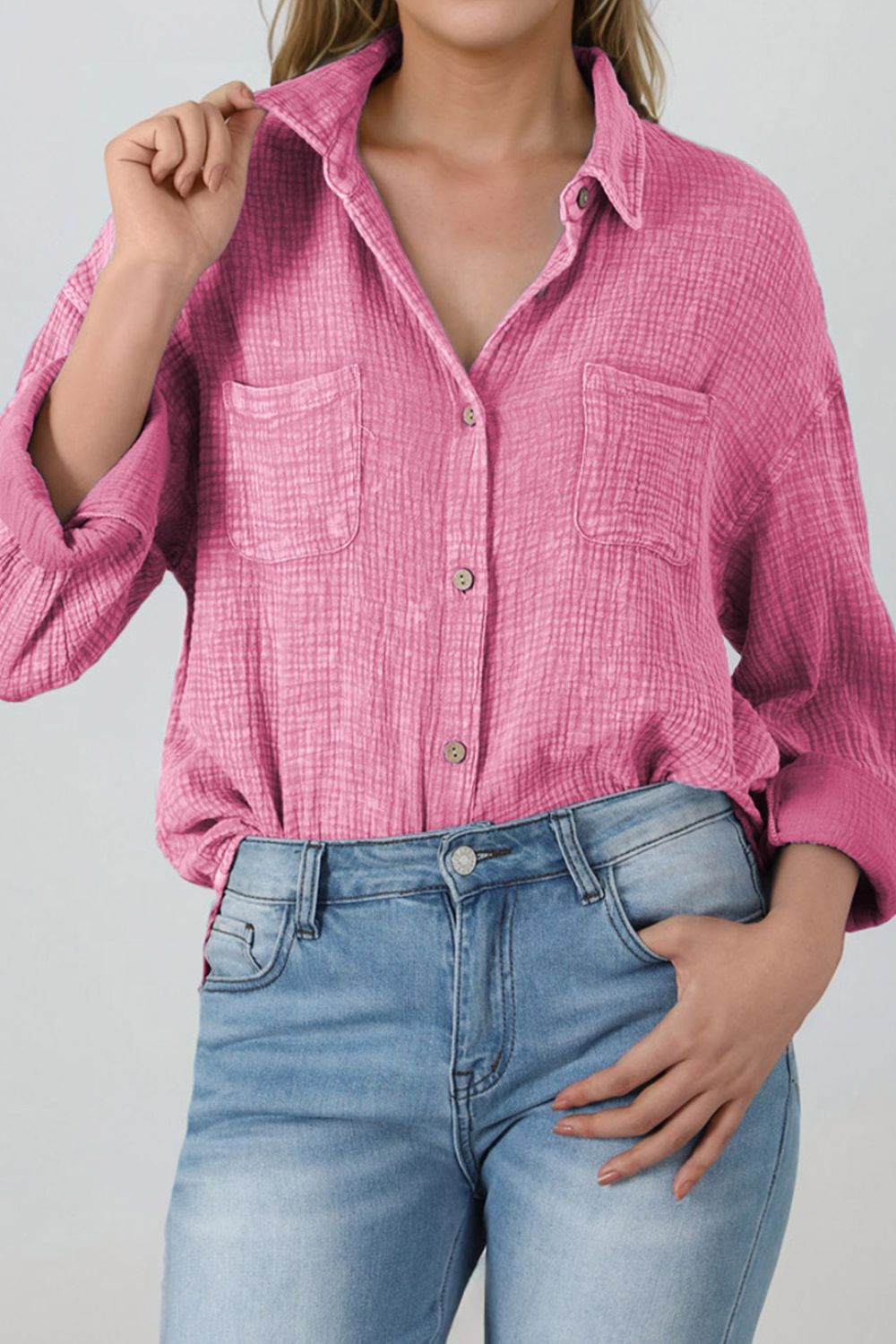 Button down collared neck long sleeve shirt with pockets.