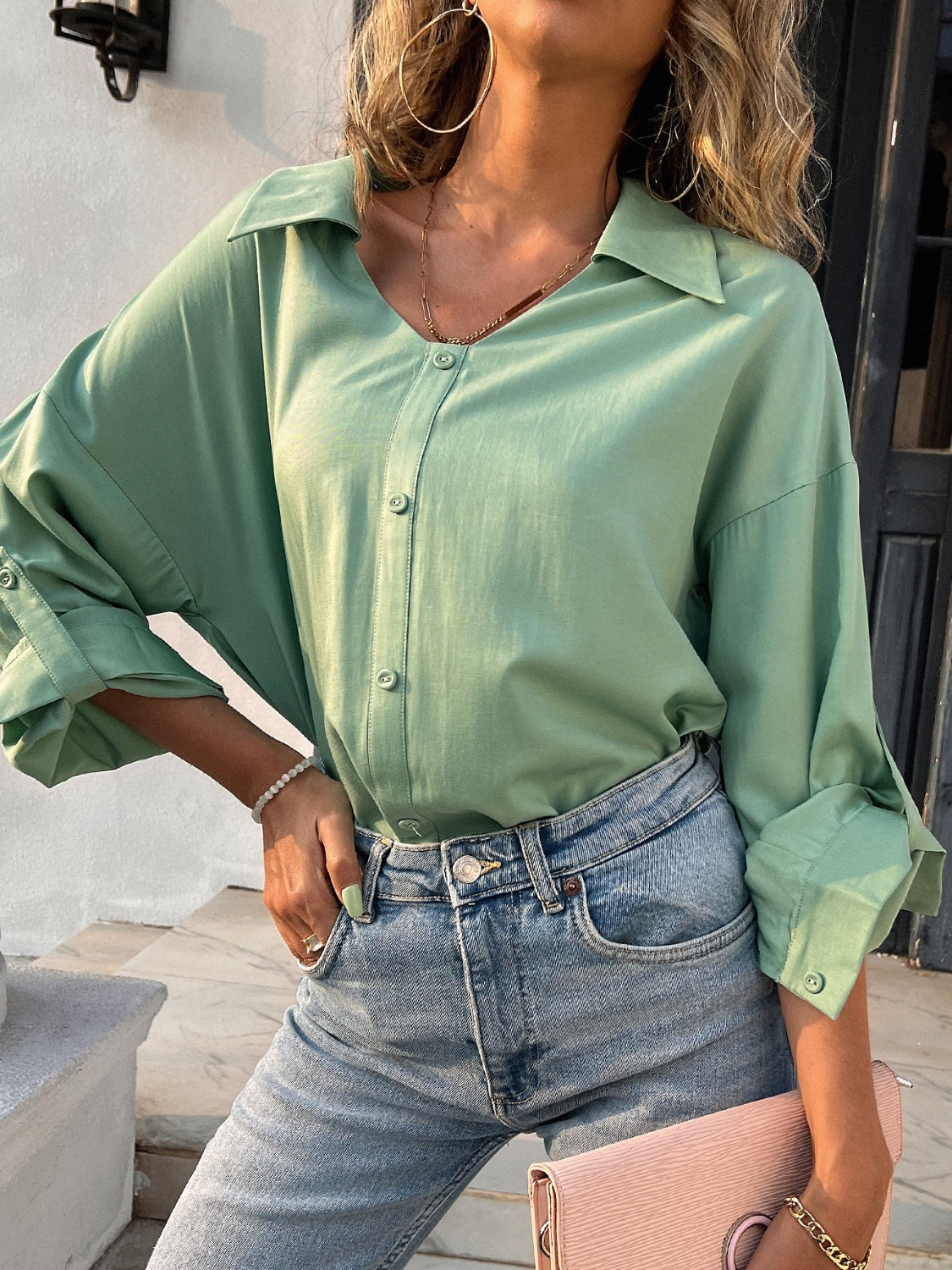 Button down collared neck long sleeve shirt with slit.