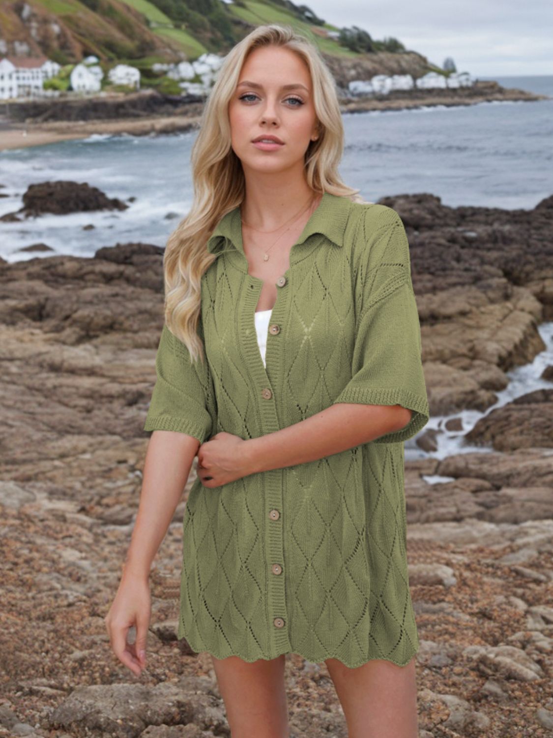 Button down eyelet collared neck knit shirt.