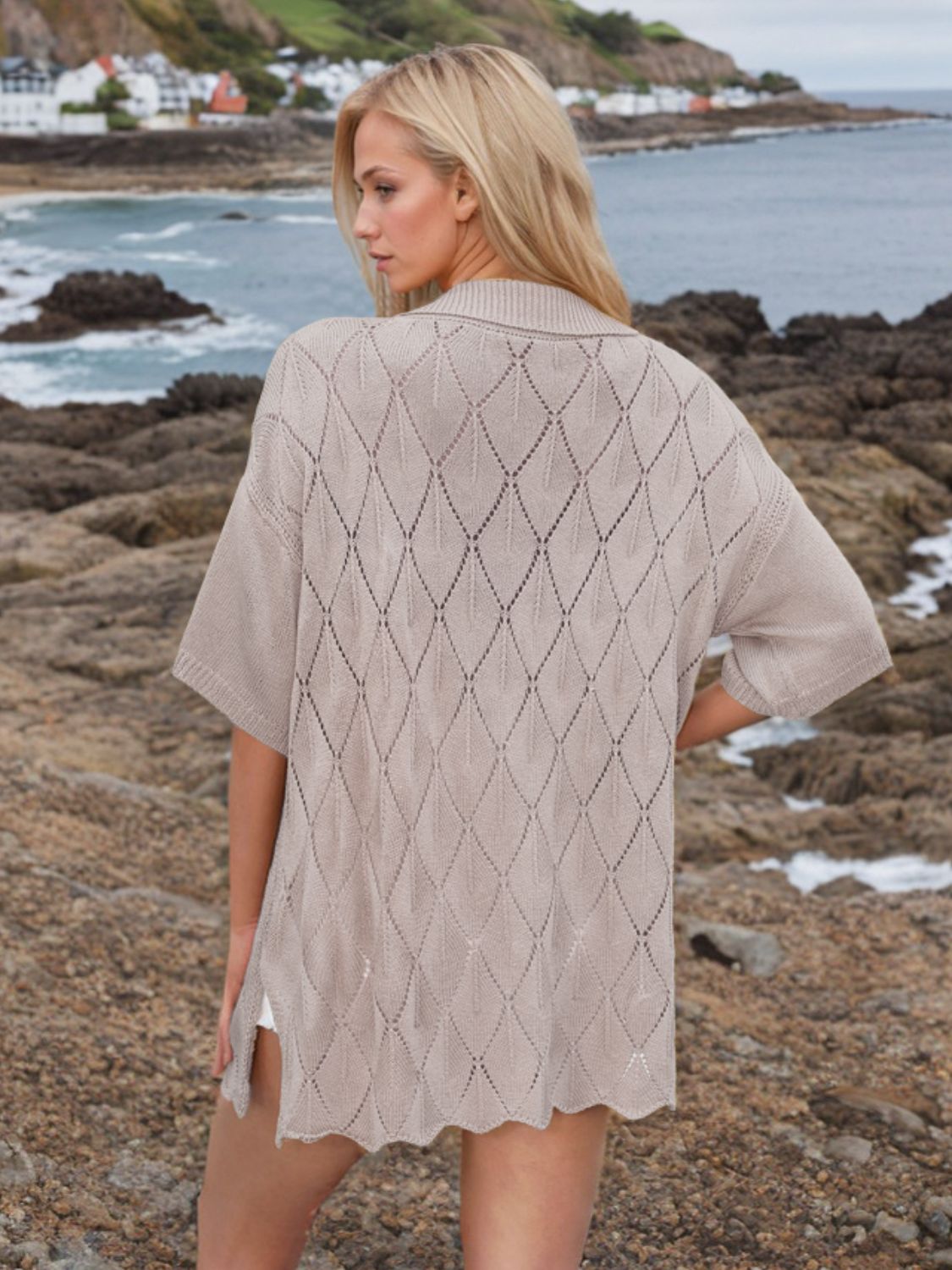 Button down eyelet collared neck knit shirt.