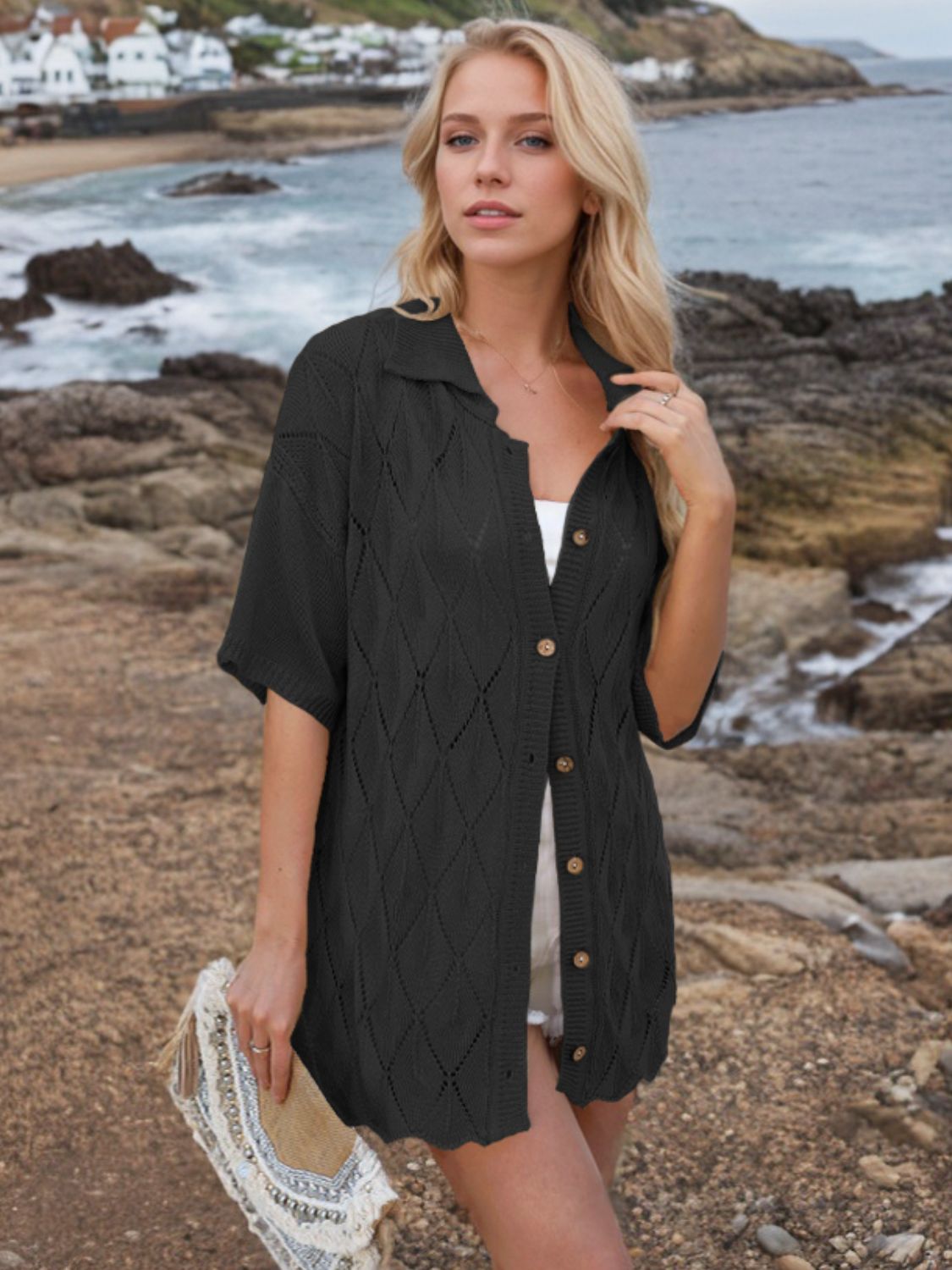 Button down eyelet collared neck knit shirt.
