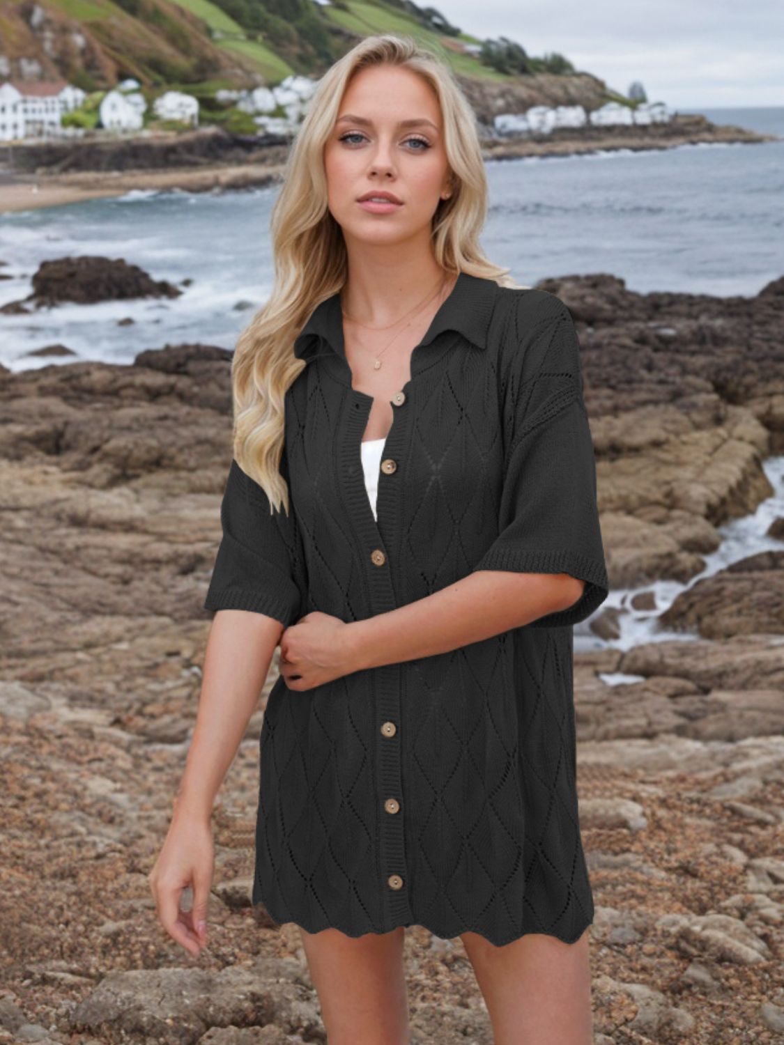 Button down eyelet collared neck knit shirt.