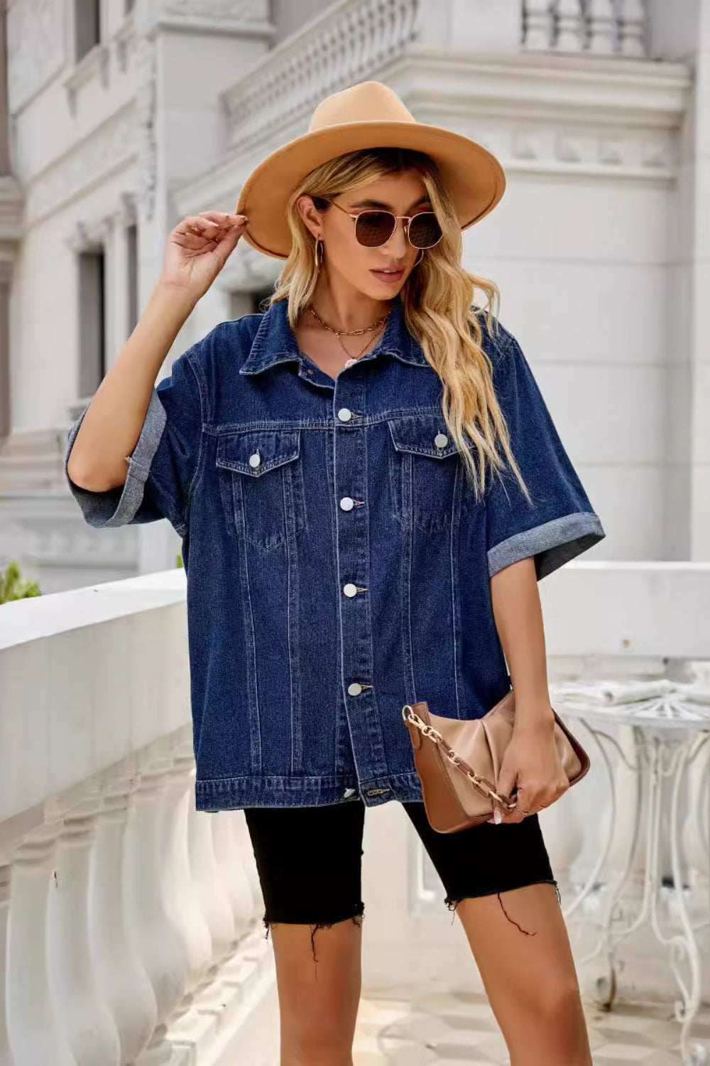 Button down half sleeve denim jacket with pockets.