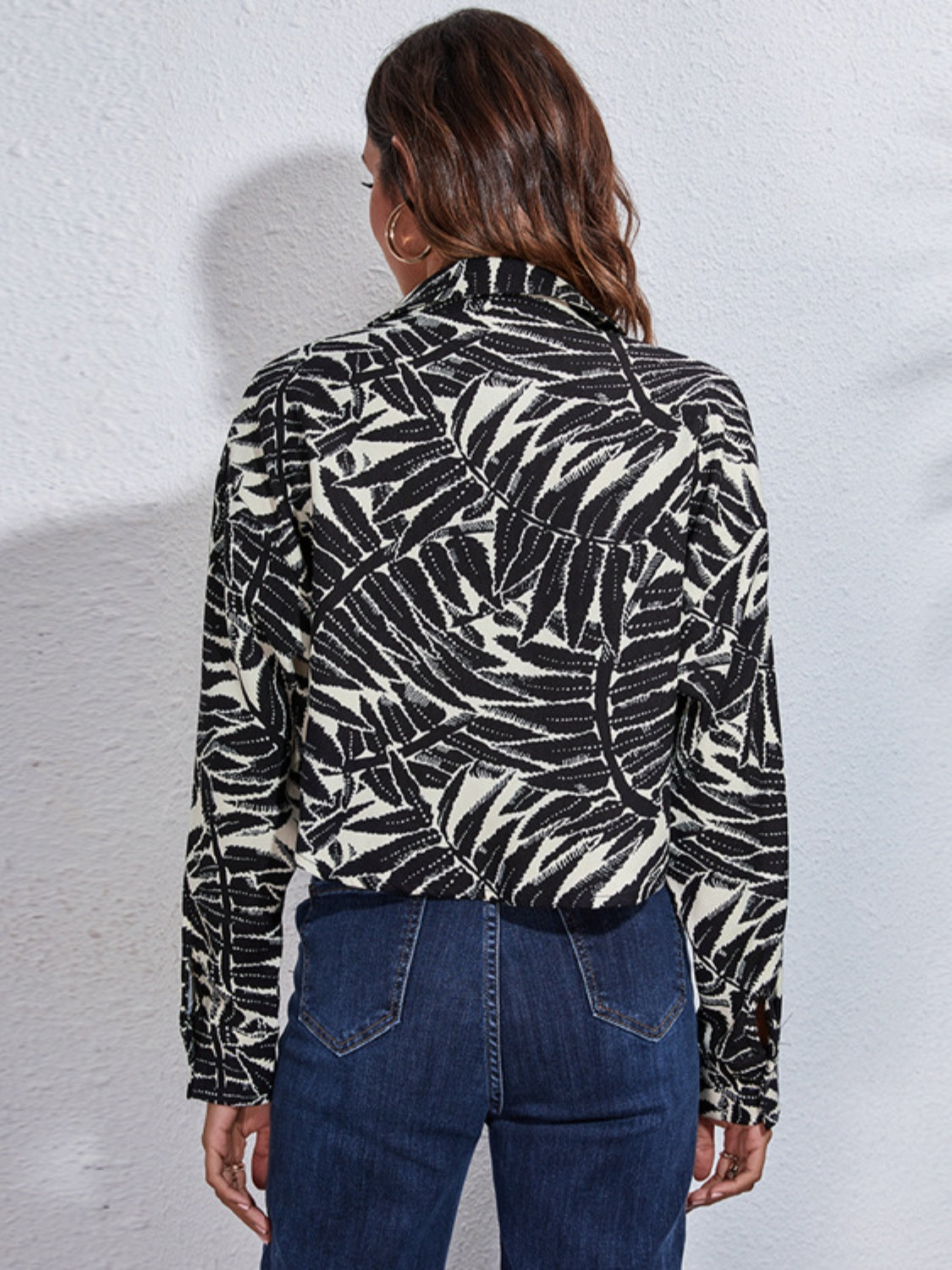 Button down printed cropped jacket with high-low hem.
