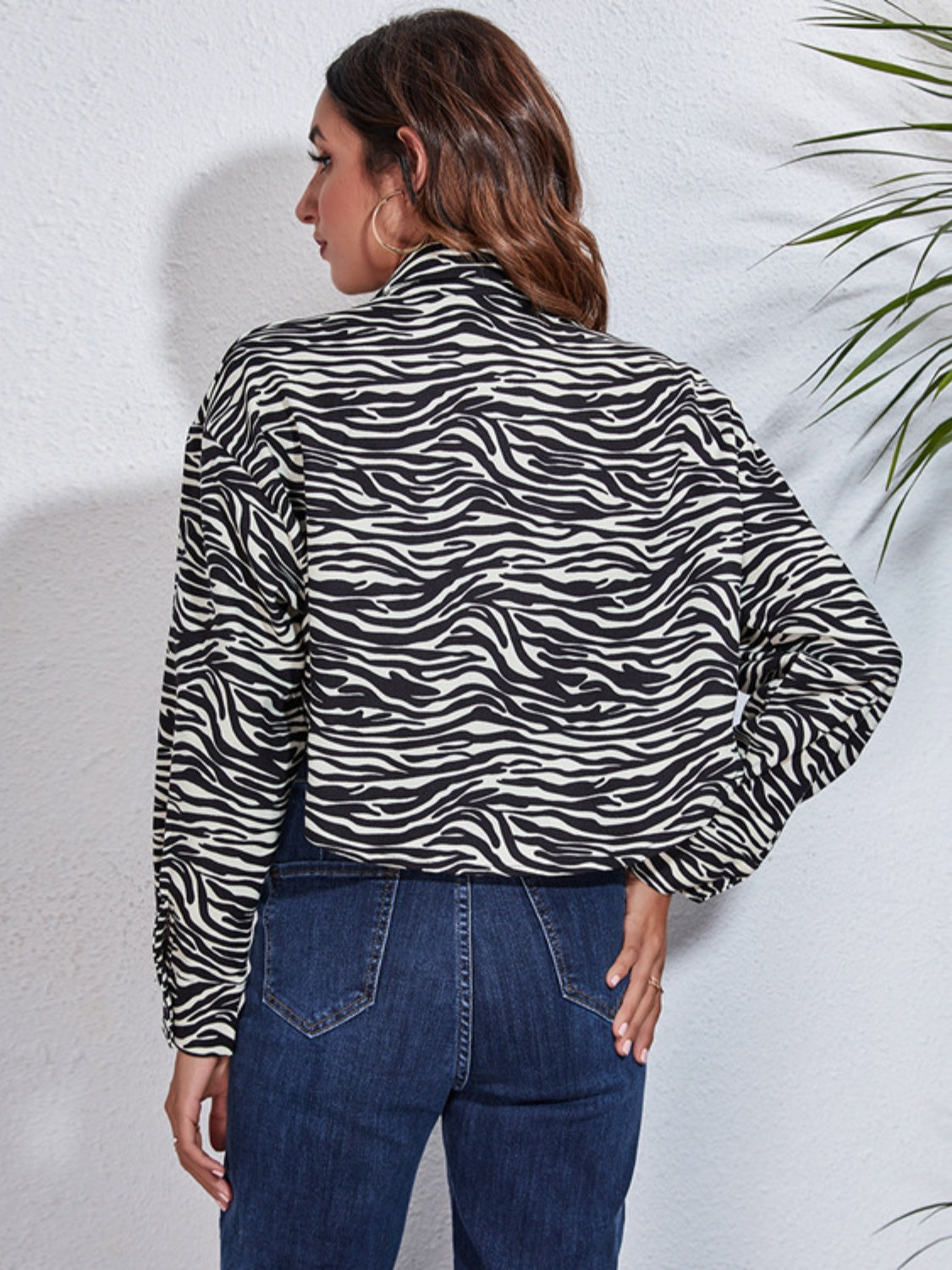 Button down printed cropped jacket with high-low hem.