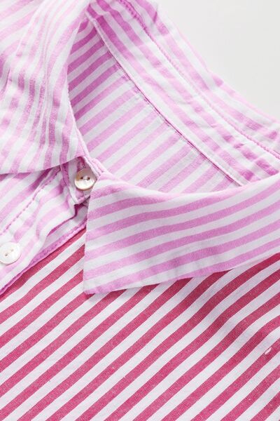 Button down striped ruffled hem shirt.