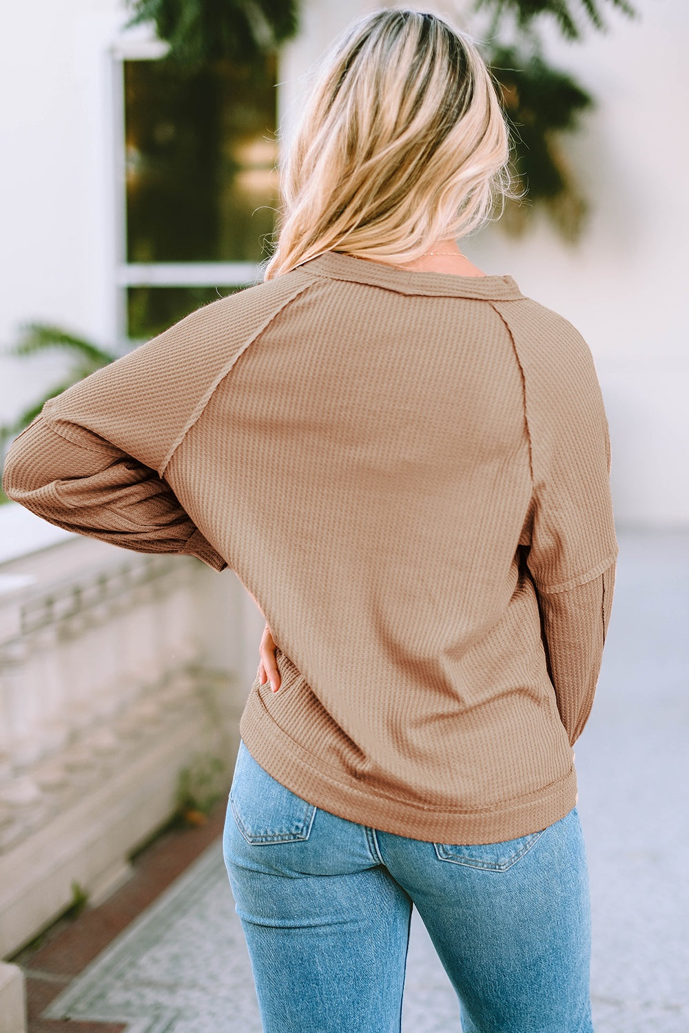 Button down V-neck waffle knit shirt.