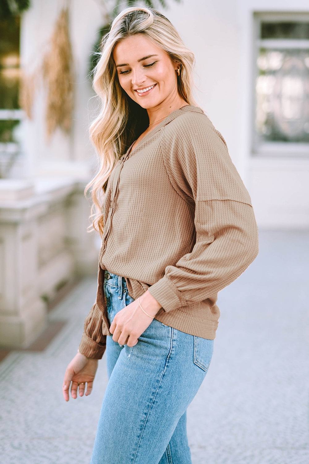 Button down V-neck waffle knit shirt.