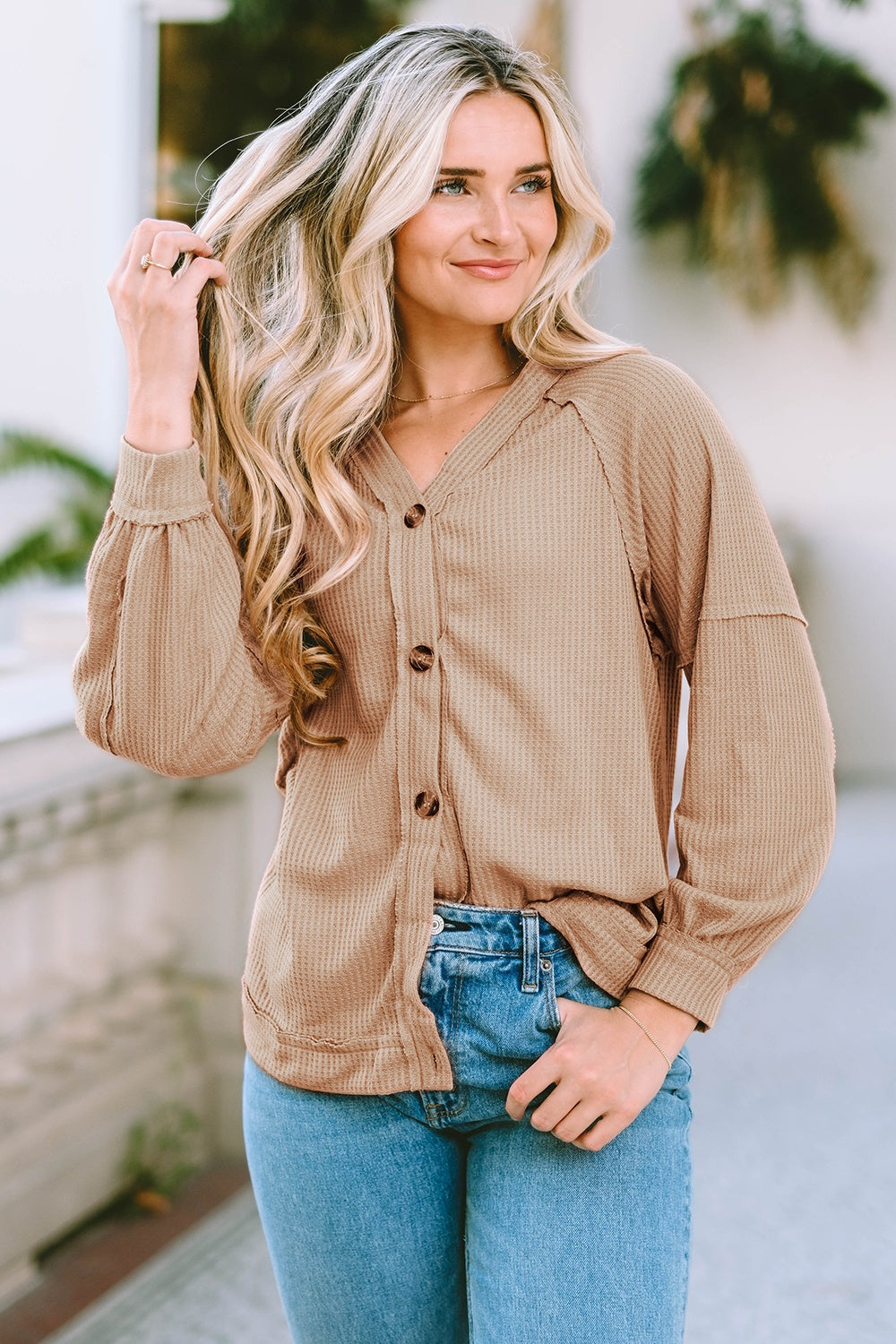 Button down V-neck waffle knit shirt.