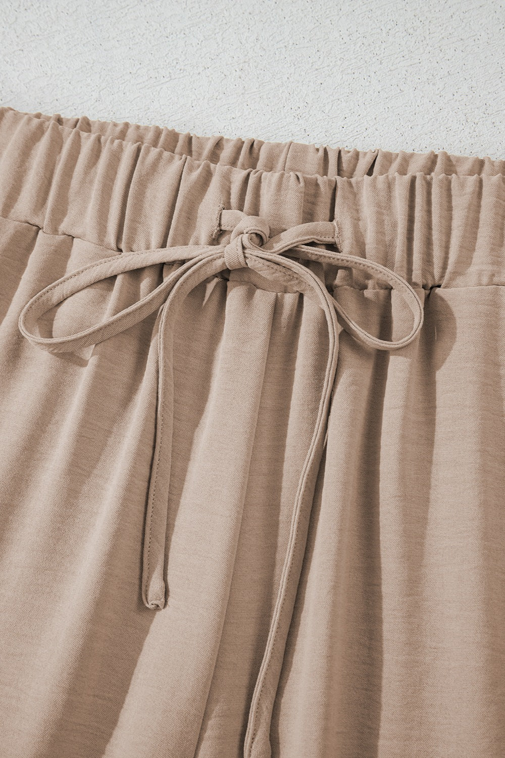 Button Down Vest and Drawstring Wide Leg Pants Set.