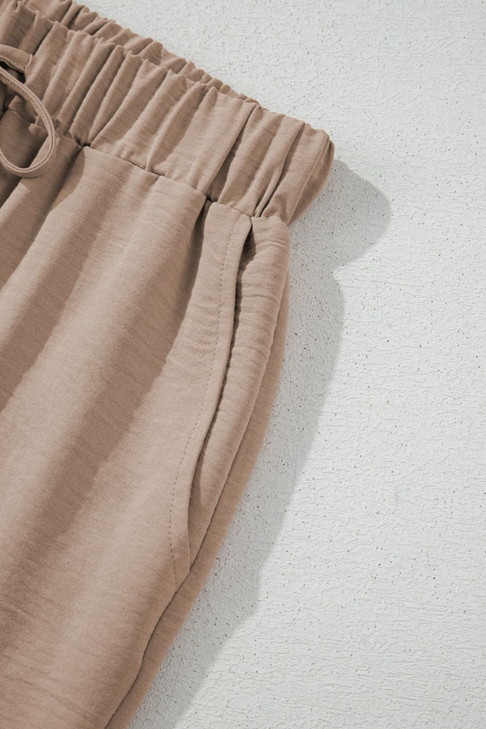 Button Down Vest and Drawstring Wide Leg Pants Set.