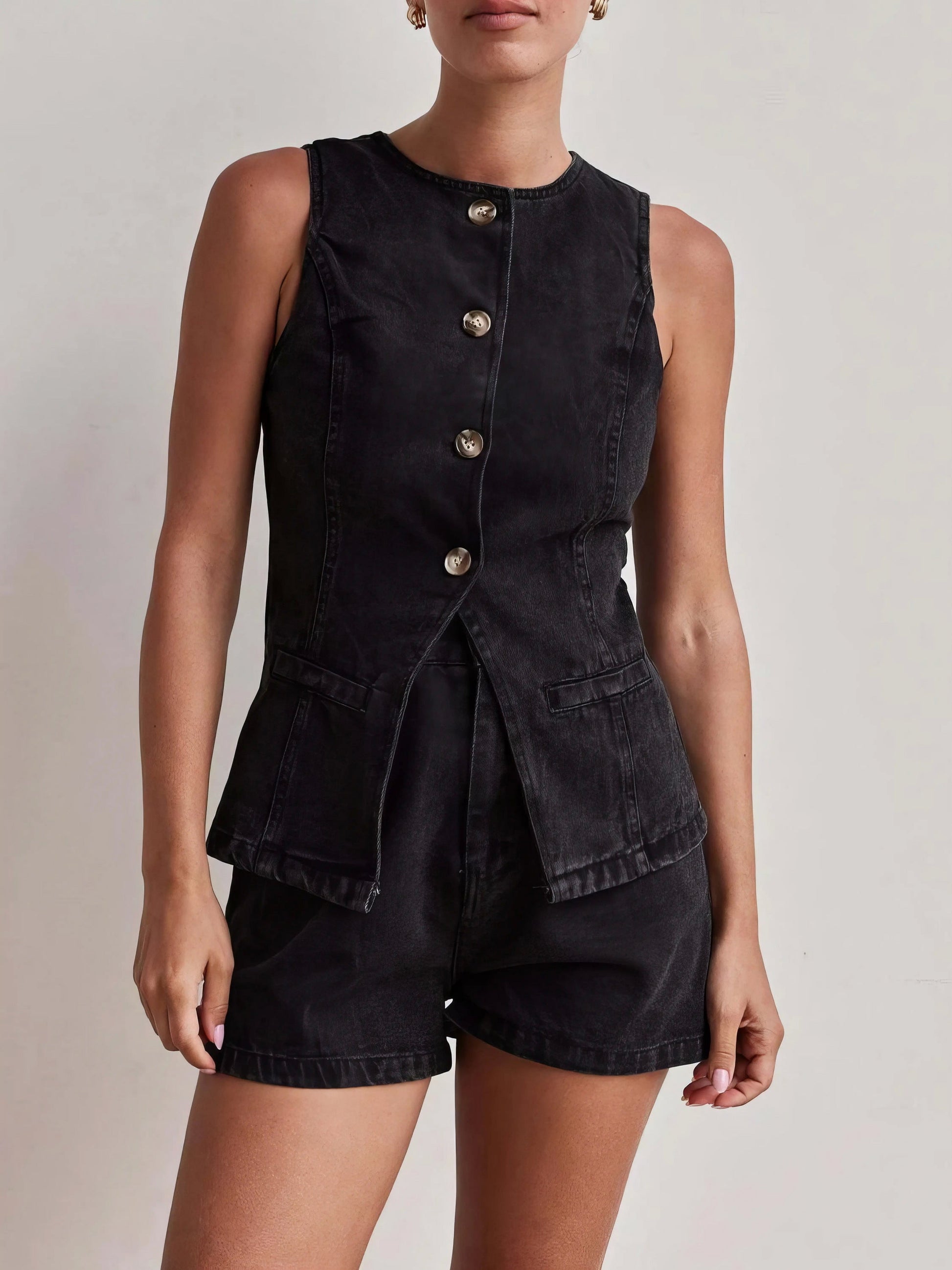 Button down vest and shorts denim set, women's two-piece denim outfit, classic denim vest, comfortable denim shorts, buttoned details, practical pockets, non-stretch cotton blend, stylish summer ensemble, perfect for casual outings