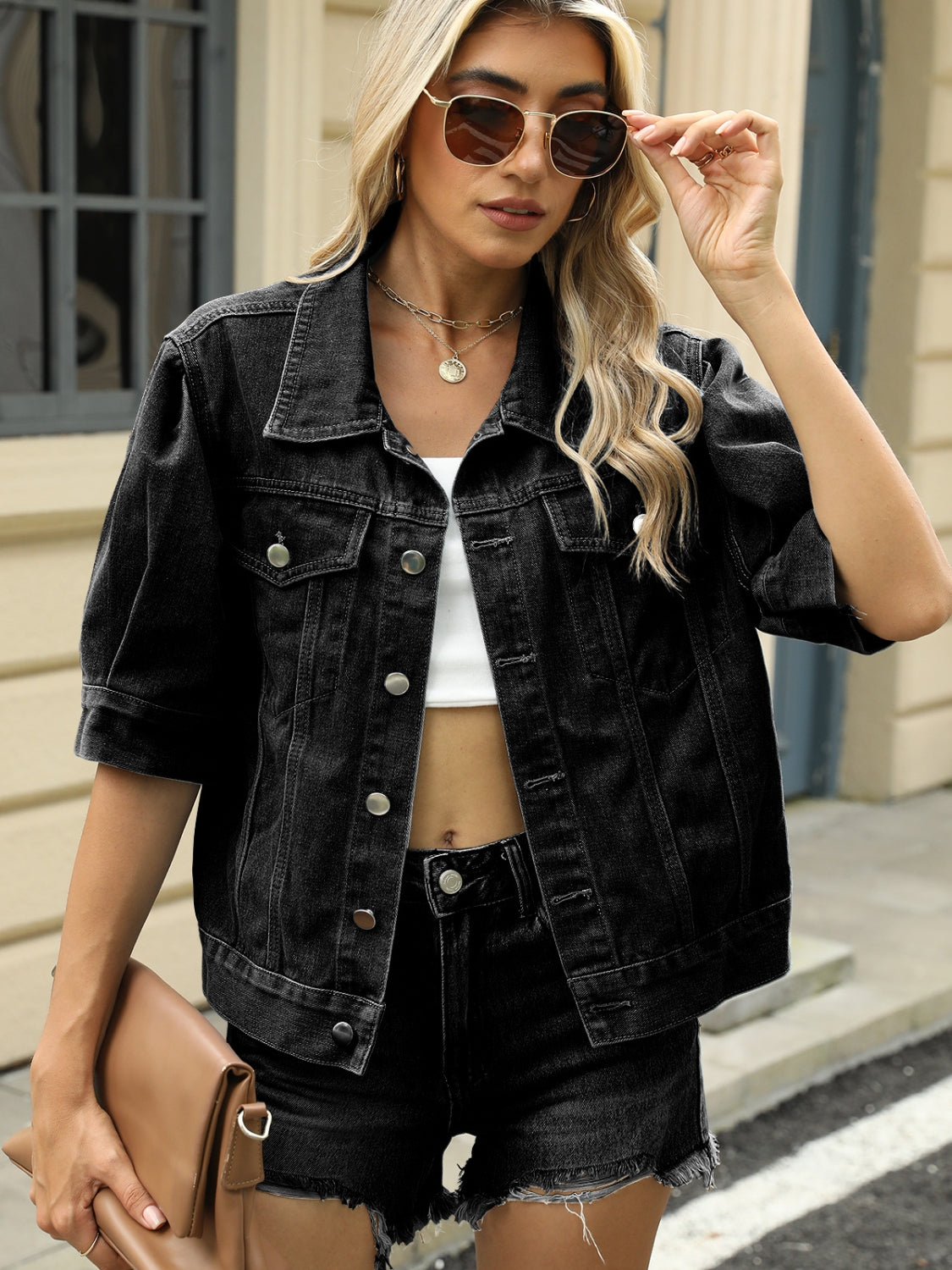 Washed button down denim jacket with pockets.