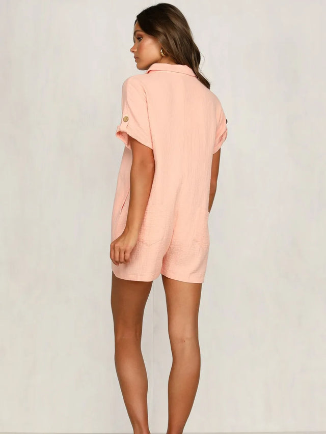 Button Front Short Sleeve Romper with Pockets.