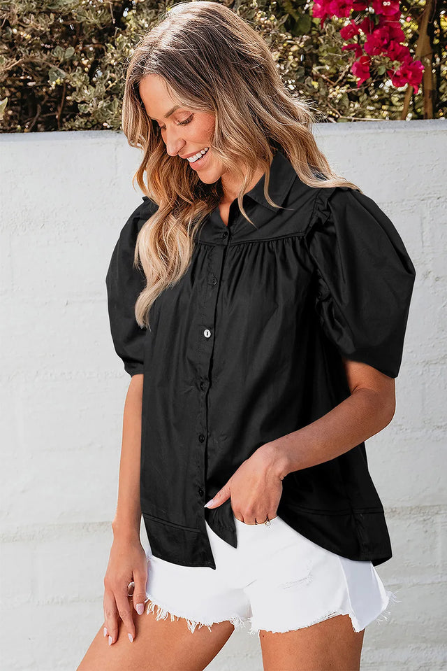 Button up collared neck short sleeve shirt.