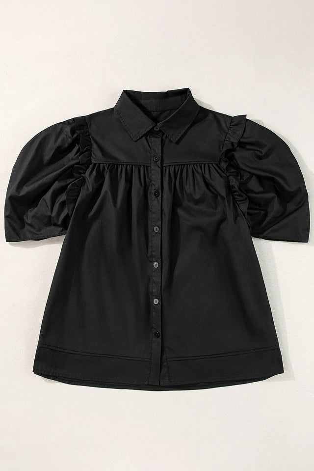 Button up collared neck short sleeve shirt.