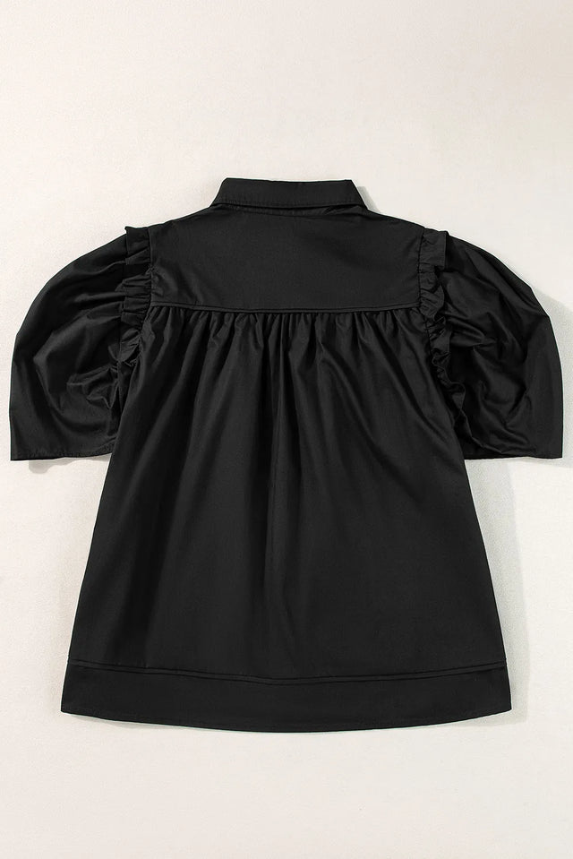 Button up collared neck short sleeve shirt.