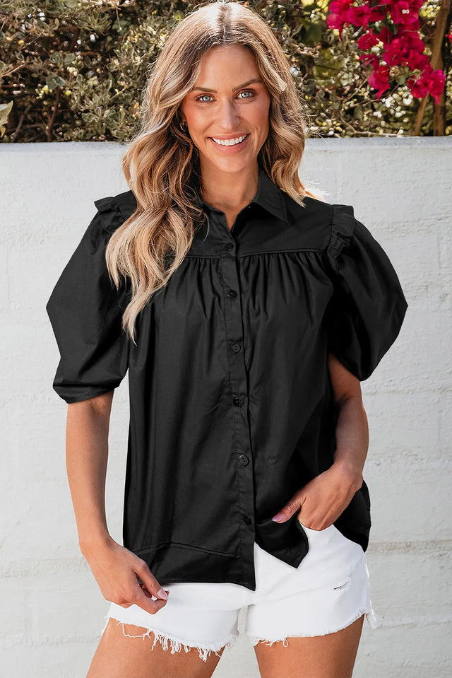 Button up collared neck short sleeve shirt.