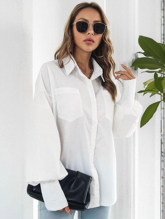 Button up dropped shoulder lantern sleeve shirt with pockets.