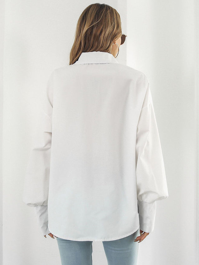 Button up dropped shoulder lantern sleeve shirt with pockets.