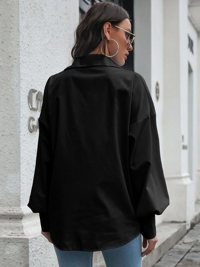 Button up dropped shoulder lantern sleeve shirt with pockets.