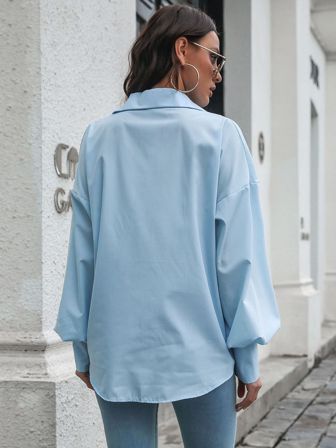 Button up dropped shoulder lantern sleeve shirt with pockets.