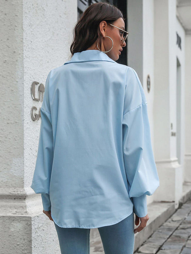 Button up dropped shoulder lantern sleeve shirt with pockets.
