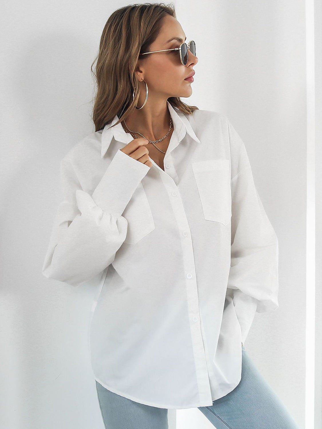 Button up dropped shoulder lantern sleeve shirt with pockets.