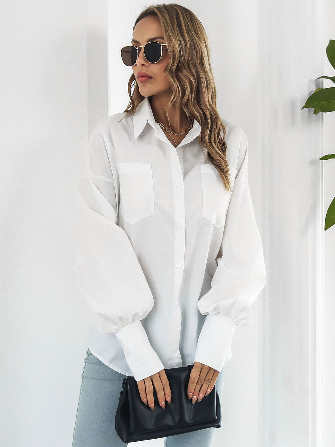Button up dropped shoulder lantern sleeve shirt with pockets.