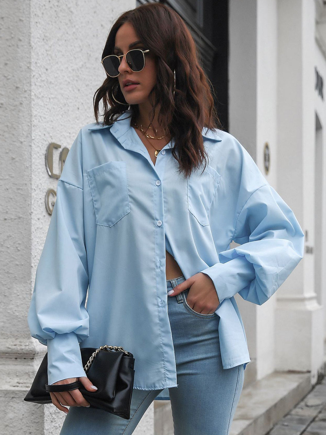 Button up dropped shoulder lantern sleeve shirt with pockets.