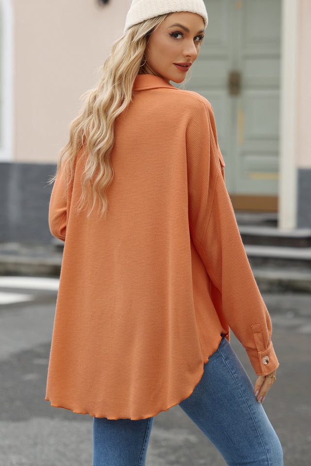 Button up long sleeve shirt.