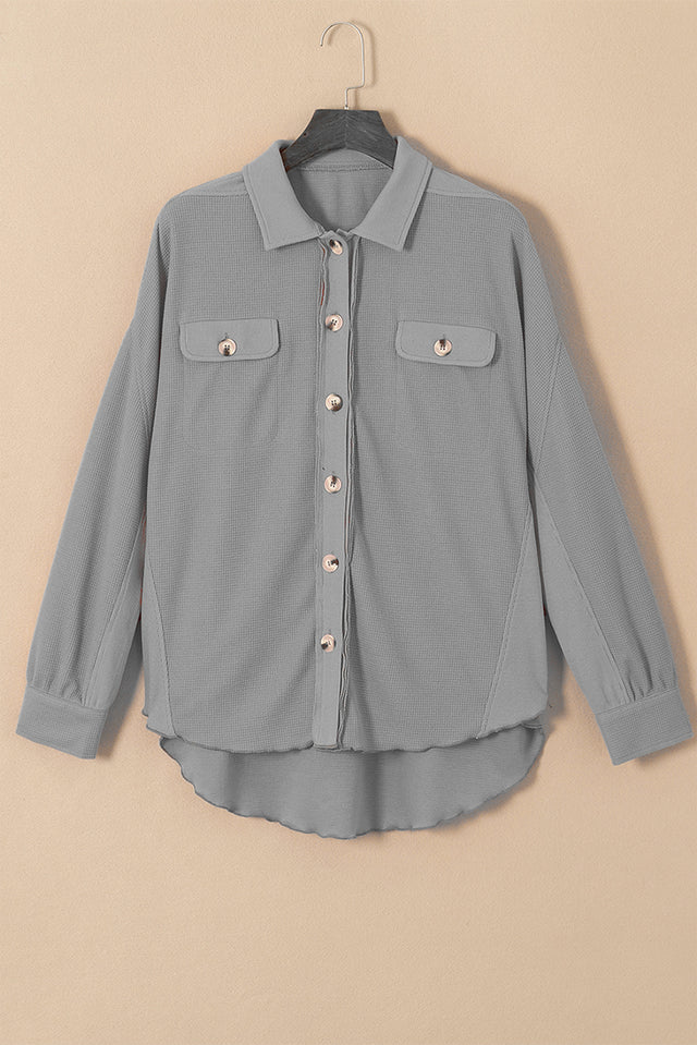 Button up long sleeve shirt.