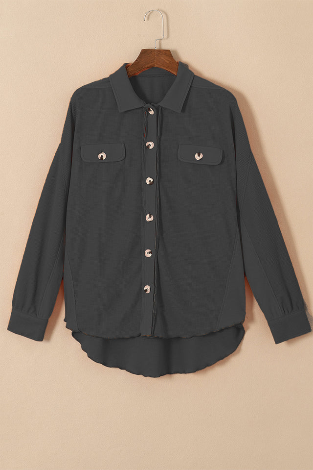 Button up long sleeve shirt.