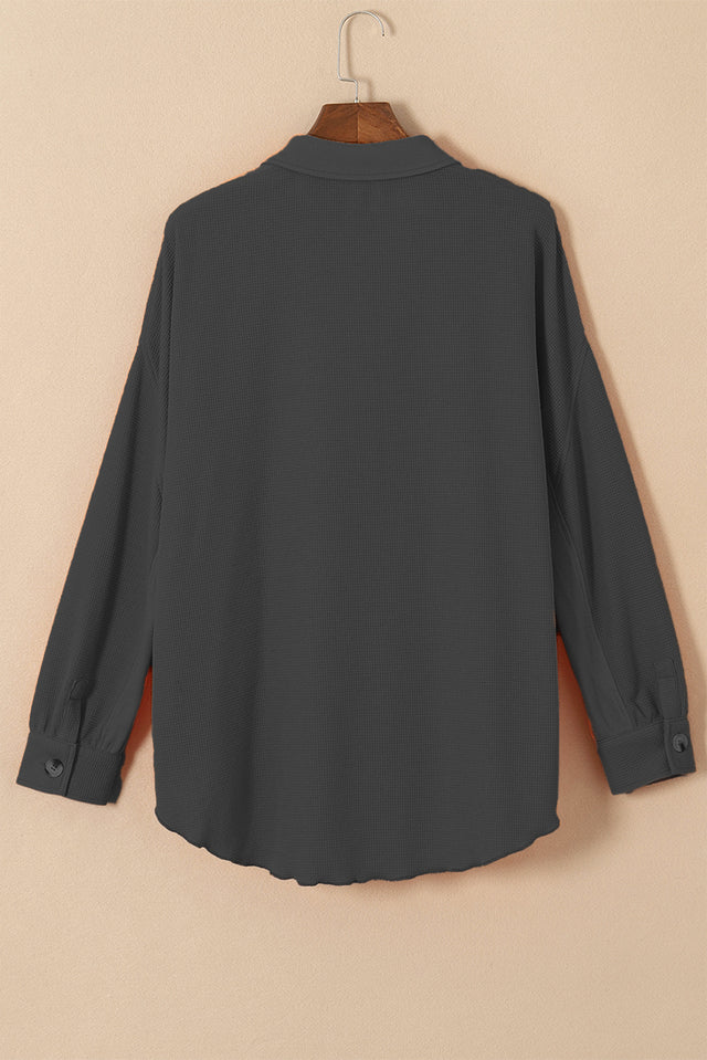 Button up long sleeve shirt.