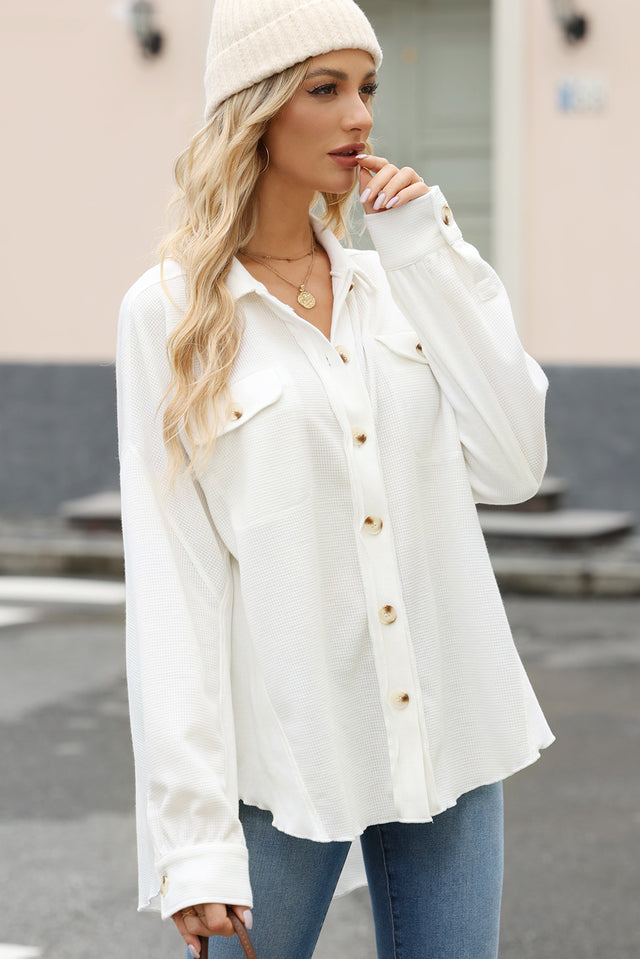 Button up long sleeve shirt.