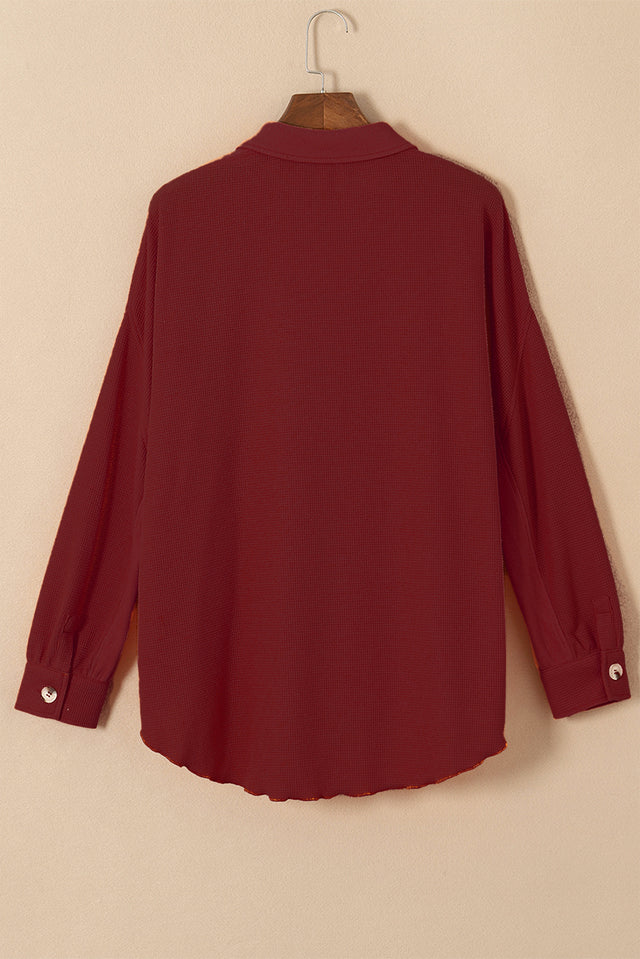 Button up long sleeve shirt.