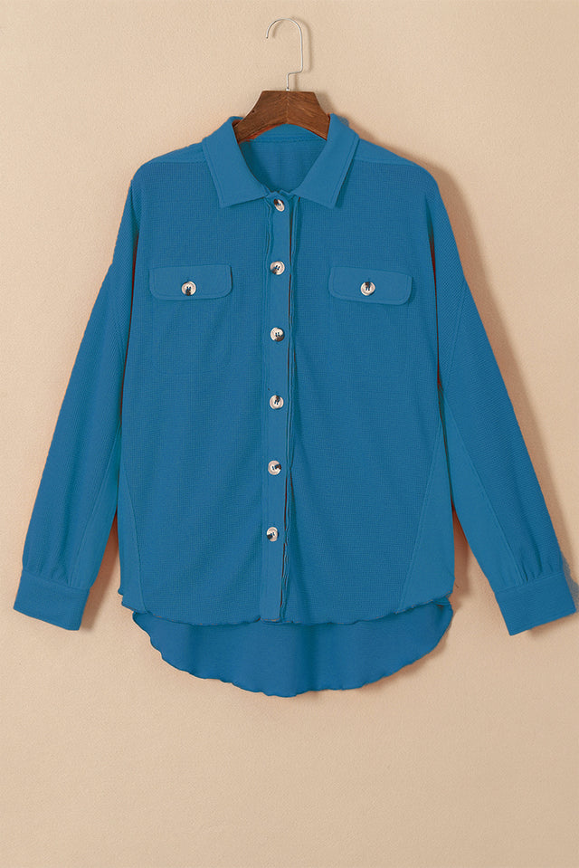 Button up long sleeve shirt.