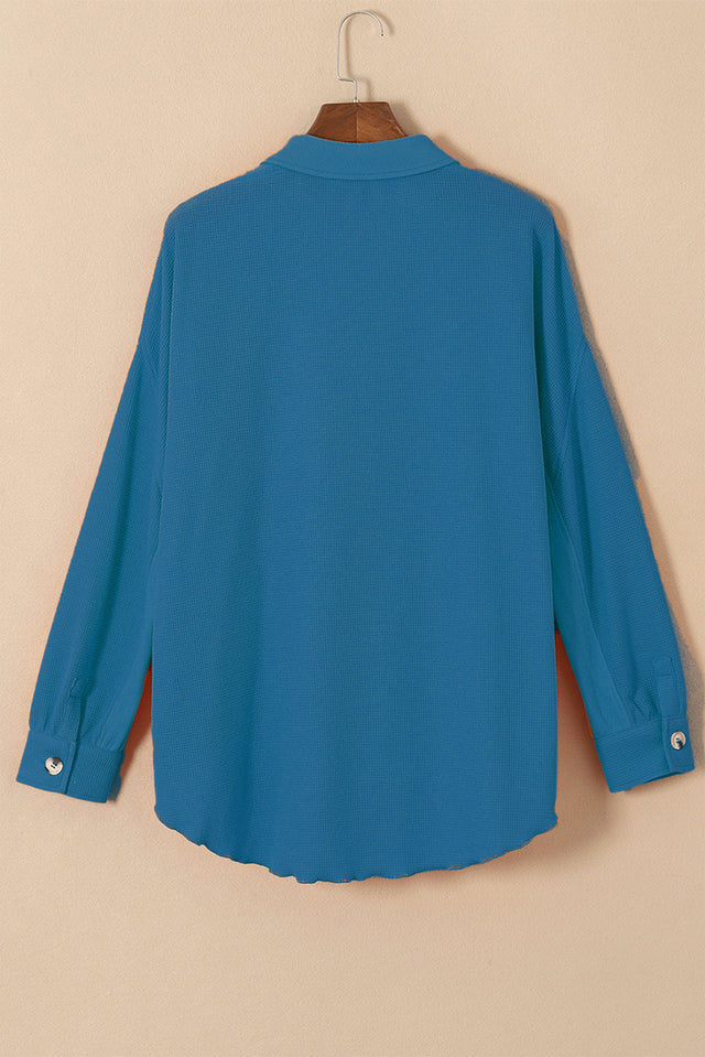 Button up long sleeve shirt.