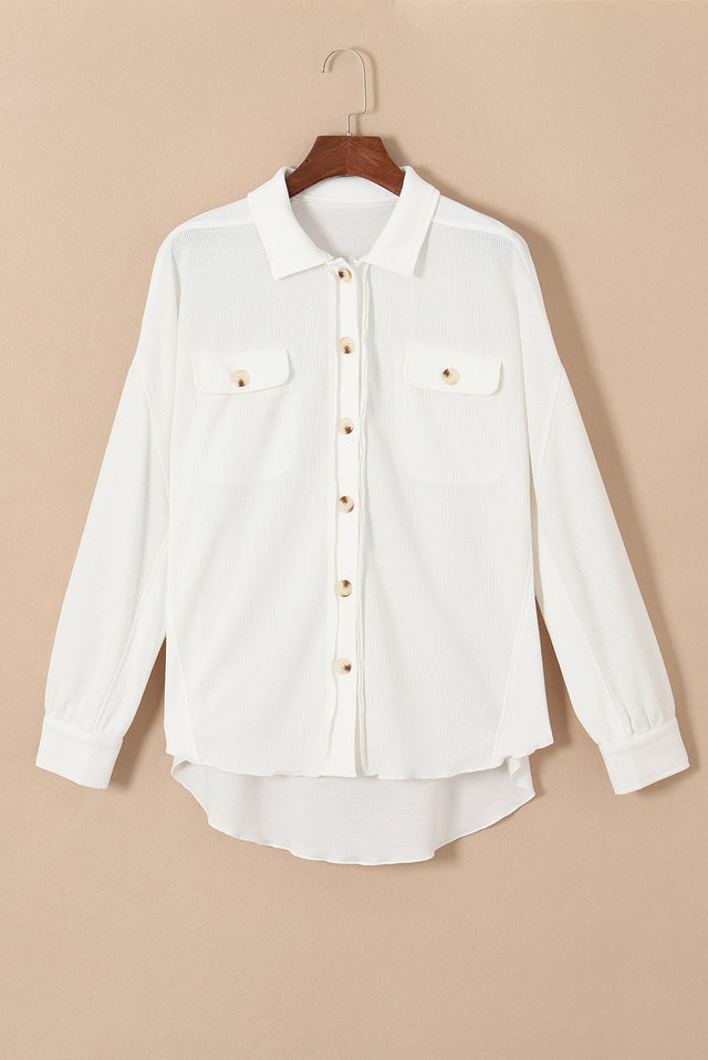 Button up long sleeve shirt.