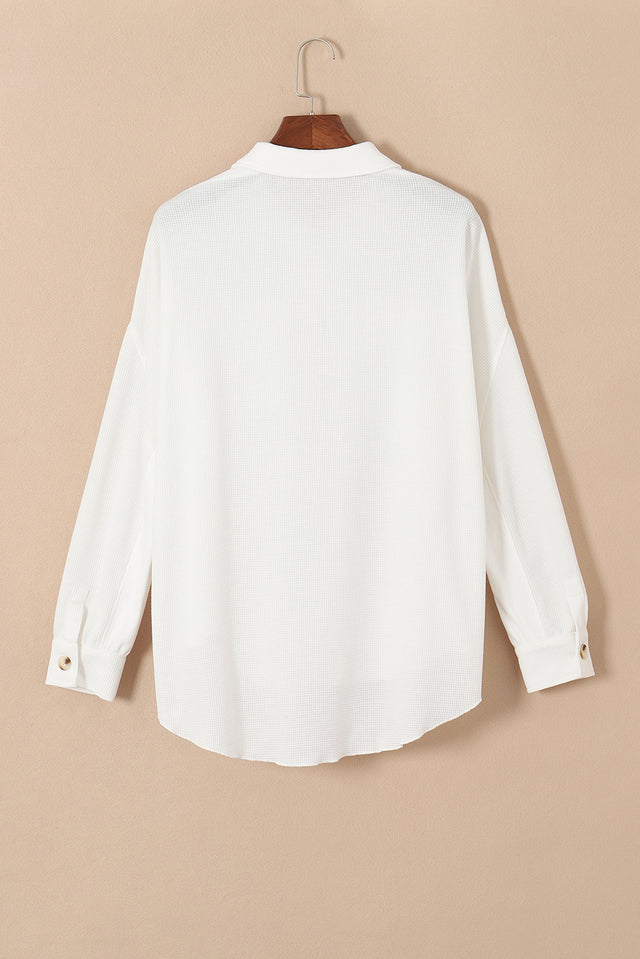 Button up long sleeve shirt.
