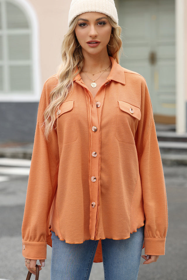 Button up long sleeve shirt.