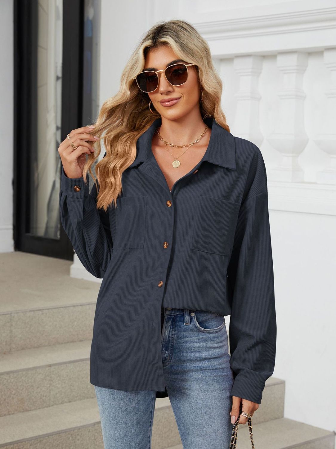 Button up long sleeve shirt with breast pockets.