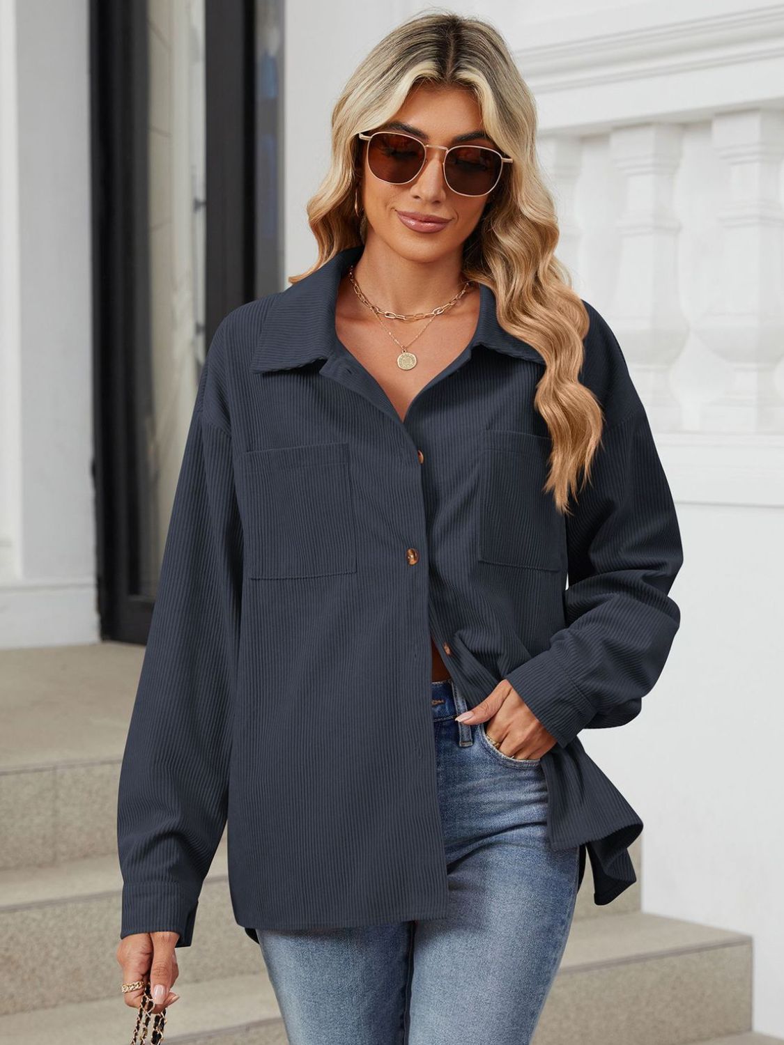 Button up long sleeve shirt with breast pockets.