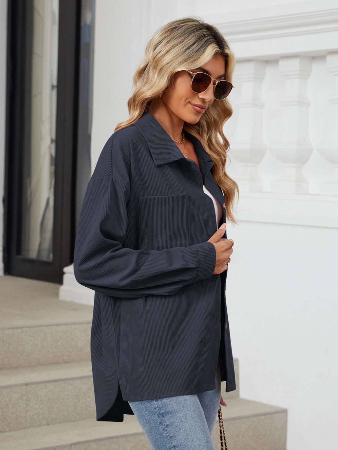 Button up long sleeve shirt with breast pockets.