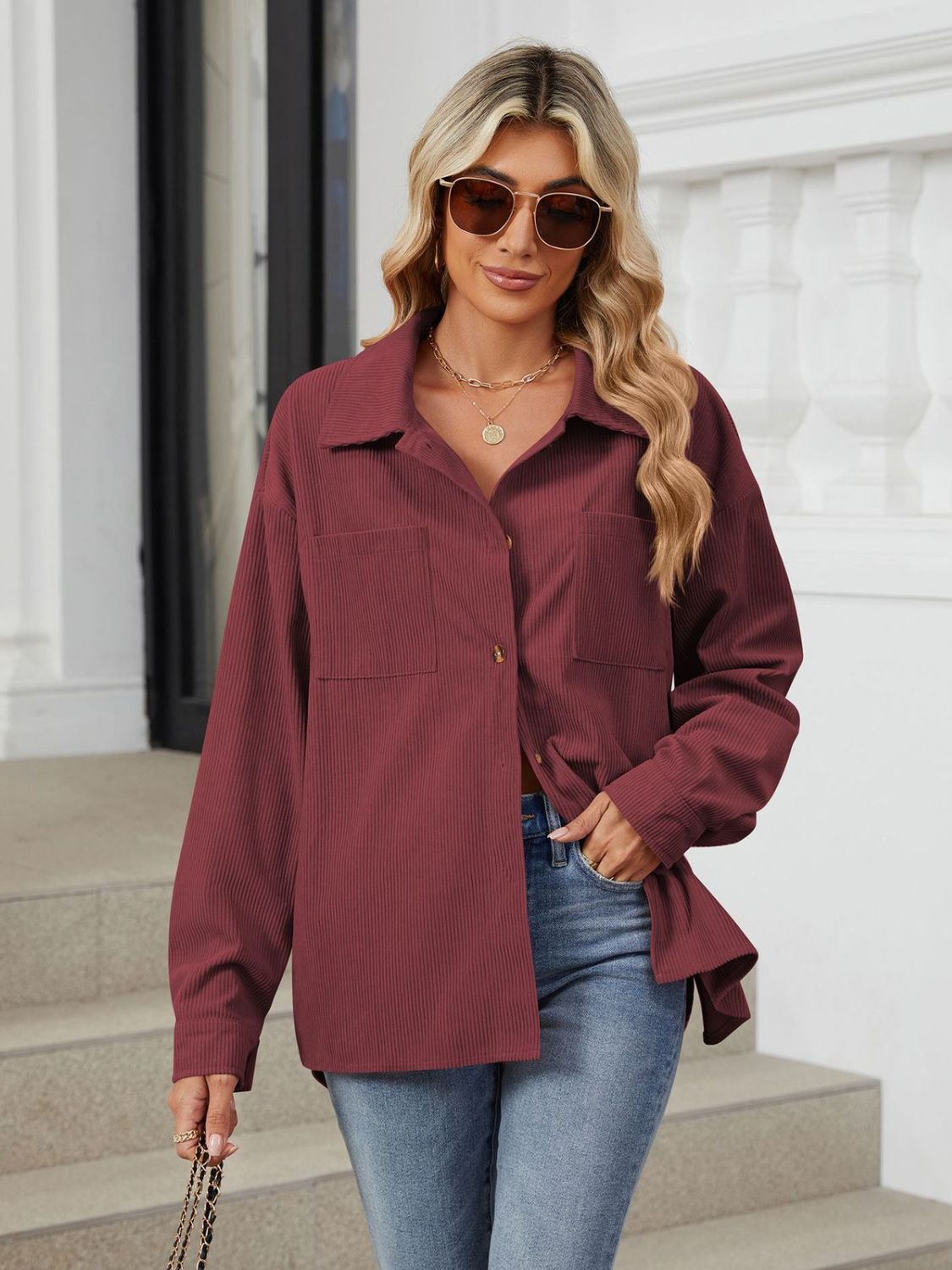 Button up long sleeve shirt with breast pockets.