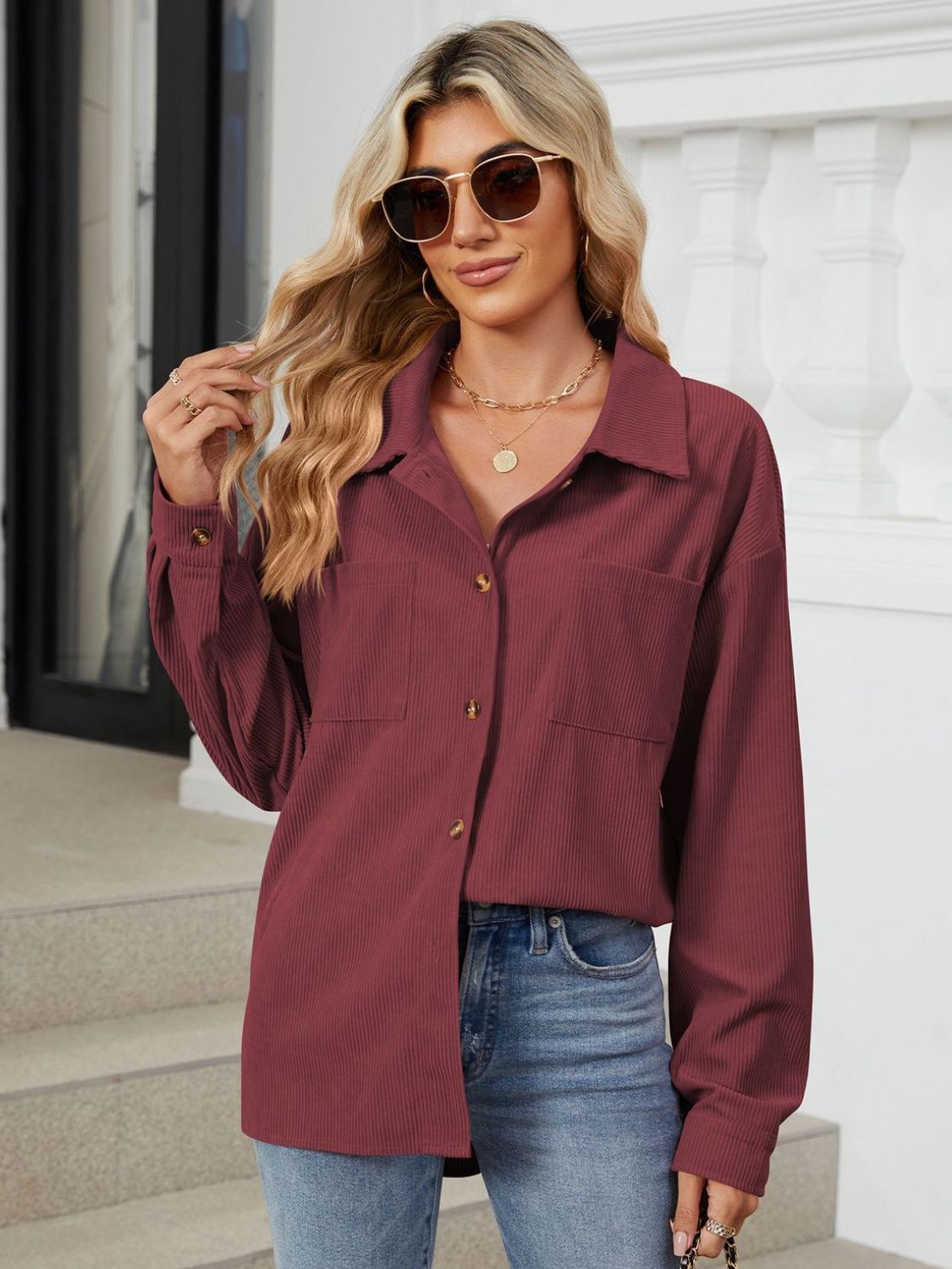Button up long sleeve shirt with breast pockets.