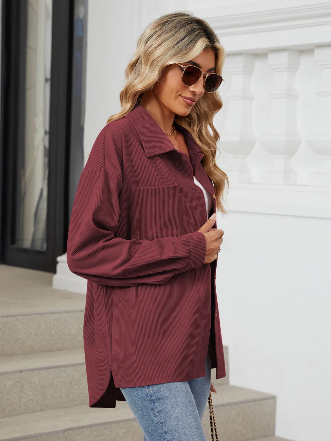 Button up long sleeve shirt with breast pockets.