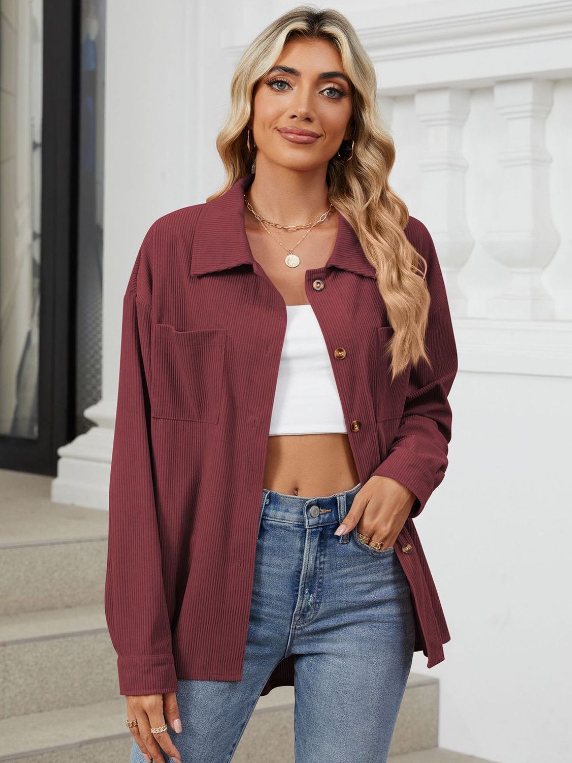 Button up long sleeve shirt with breast pockets.