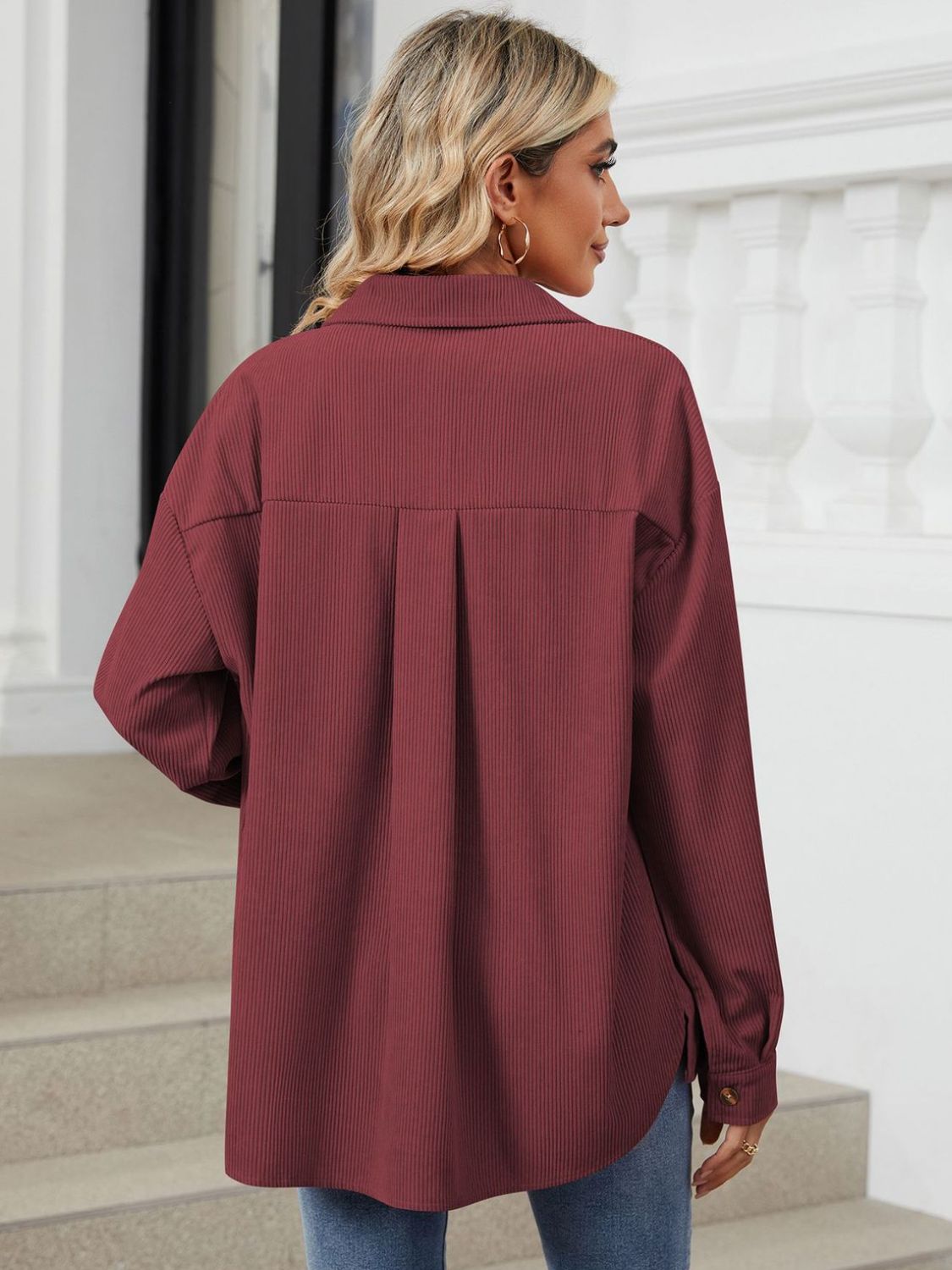 Button up long sleeve shirt with breast pockets.